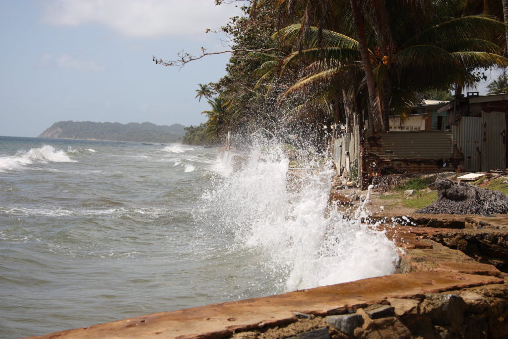 View of a seawall in the coastal community of Guayaguayare in Trinidad. The seawall offers protection to the residences along the coast. 